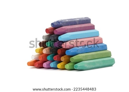 Colorful oil pastels photographed on a white background