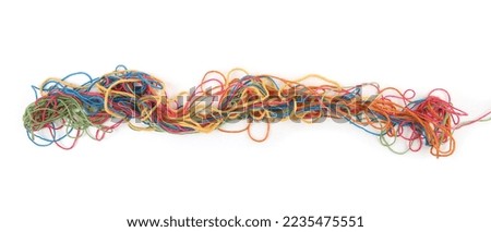 Tangled colorful cotton threads isolated on white background. Abstract thread lines chaos pattern. Royalty-Free Stock Photo #2235475551