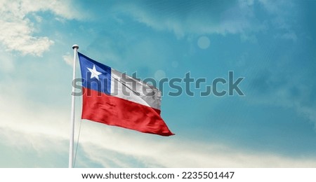 Chile national flag waving in beautiful sky.