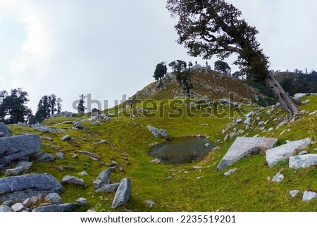 Small Water Pond, Snowline Cafe, Triund Hill, Indrahar Pass Trail, Dauladhar Range, Himachal Pradesh, India Royalty-Free Stock Photo #2235519201