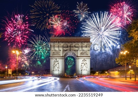 New Year fireworks display over the Arc de Triomphe in Paris. France Royalty-Free Stock Photo #2235519249