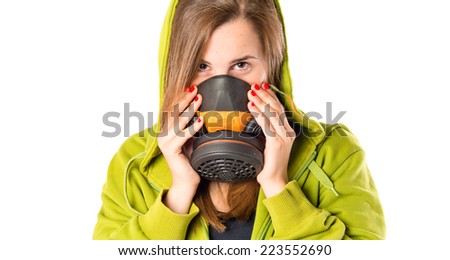 Girl with gas mask over white background
