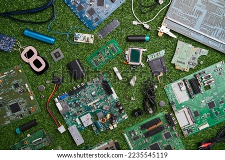 Many microchips, batteries, wires, spare parts of gadget for recycling.