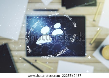 Creative concept of people icons and modern digital tablet on background, top view. Life and health insurance concept. Multiexposure