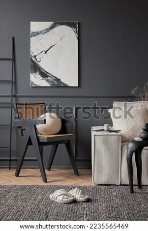 Modern living room interior with mock up poster frame, rattan armchair, modular sofa, grey rug, slippers, beige pillow, ladder, vase with dried flowers and personal accessories. Home decor. Template.