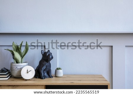 Modern scandinavian living room interior with design commode, copy space, clock, plants, boooks, cacti, decoration and elegant accessories. Template. Stylish home decor.