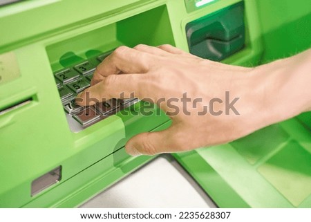 Man enter pin code at ATM security keyboard. Service people hand. Credit card service. Safety tecjnology. Loan finance wallet. Street keypad access