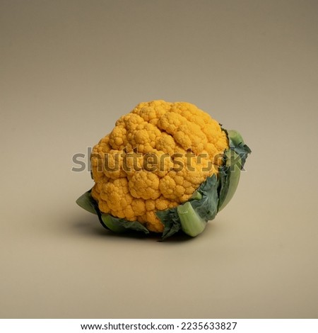 fresh Cauliflower on blue background 
