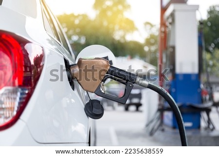Fuel pumps gasohol, gasoline ,benzine, at a gas station ,price gasoline concept. Royalty-Free Stock Photo #2235638559