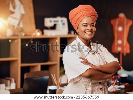 Fashion, designer and african or black woman in portrait for small business startup, creative career or textile industry in a workshop studio. Fabric, manufacturing and retail clothes of proud woman Royalty-Free Stock Photo #2235667559
