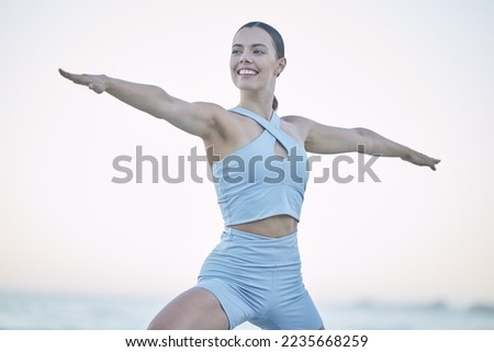 Fitness, stretch and woman exercise or workout in nature at sunset for health and wellness. Pilates, body and happiness with a fit, strong female or personal trainer doing warrior two yogi pose Royalty-Free Stock Photo #2235668259