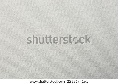 Blank white canvas as background, closeup view