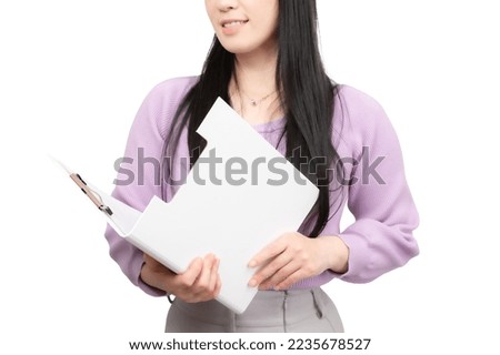 Smiling business woman with files on white background.