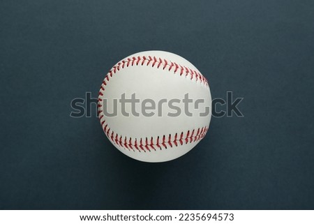 Baseball ball on dark background, top view. Sports game