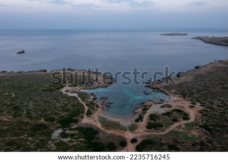 Wonderful shots of the beaches of the island of Menorca, beautiful white and red sands, its blue and turquoise waters, thanks to its marine vegetation you can see the bottom clearly 