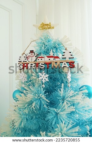 Gorgeous Light Blue Christmas Tree in White Room