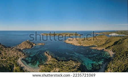 Wonderful shots of the beaches of the island of Menorca, beautiful white and red sands, its blue and turquoise waters, thanks to its marine vegetation you can see the bottom clearly because of the cry