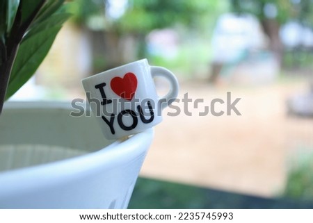 I love you love cup in plant pot  image