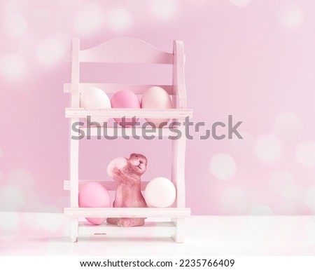 Easter background. Easter bunny on a festive background. Easter eggs. bokeh. copy space