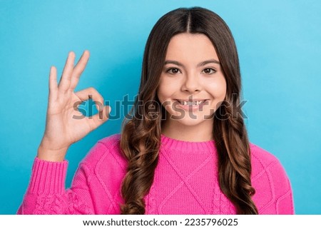 Close up photo of cheerful lady wear trendy clothes hand demonstrate okey symbol enjoy quality product isolated on blue color background