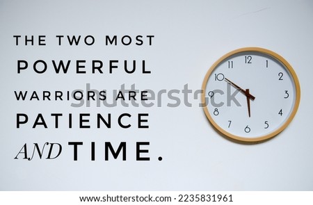 Motivational and inspirational quote - The most powerful warriors are patience and time. Inspire quote written on wall clock background.