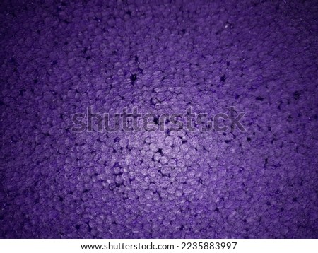 dark purple background made of styrofoam