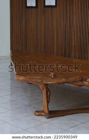 Table made from  root wood with melamine finishing in the house. Meja 