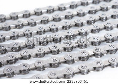 Abstract background texture of oiled roller chain. Top view.Horizontal image