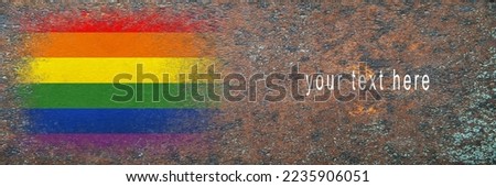 Flag of LGBT. Flag painted on rusty surface. Rusty background. Copy space. Textured creative background