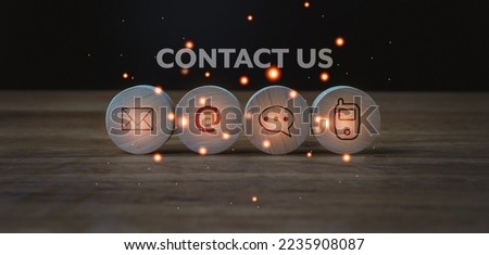 Wood sphere symbol telephone, mail, address, chat, mobile phone. Website page contact us or e-mail marketing concept. Customer service and information electronic mail and internet sign on wood.