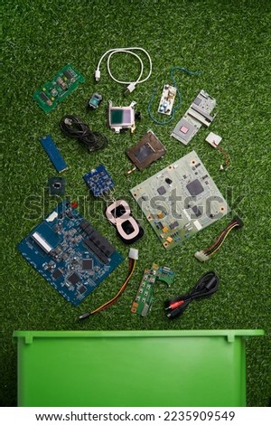 Many microchips, batteries, wires, spare parts of gadget for recycling.
