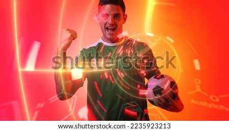 Cheerful caucasian sportsman with neon chemical structure in background. Digital composite, soccer, copy space, sport, computer, abstract, chemistry, success.
