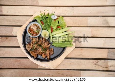 Spicy Grilled Pork Salad (Moo Yang Nam Tok), Traditional Thai food recipe