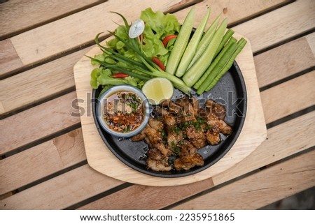 Spicy Grilled Pork Salad (Moo Yang Nam Tok), Traditional Thai food recipe