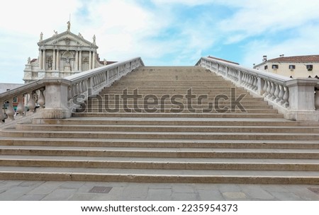 stairway of the bridge called DEGLI SCALZI which means barefooted ones and no people in Venice in Italy Royalty-Free Stock Photo #2235954373