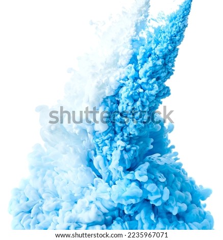 Photo of mixed color paint drop abstract art background over white