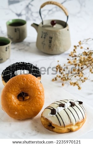 Many kinds of Donut, donat or doughnuts. Selective focus
