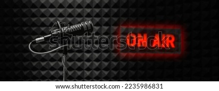 background with professional microphone and on air sign Royalty-Free Stock Photo #2235986831