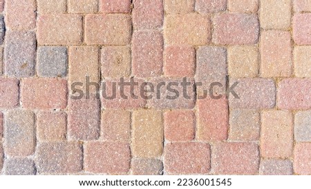 Photo of a brick pavement.