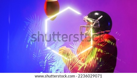 Side view of american football player playing with ball by illuminated hexagon and plants. Copy space, composite, sport, competition, illustration, glowing, nature, shape and abstract concept.