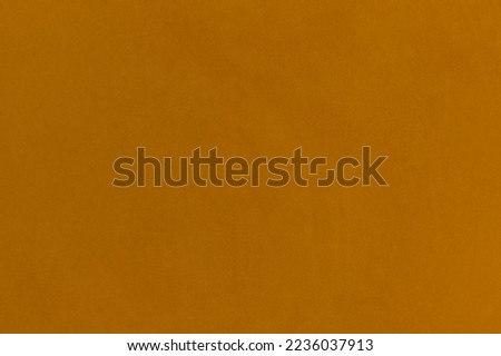 Mustard brown color wall texture blank background surface plaster abstract empty.