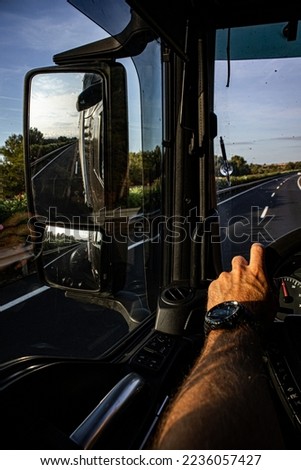 Truck Driver his point of view on the road Royalty-Free Stock Photo #2236057427
