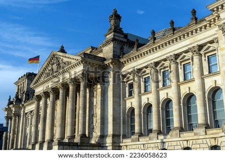 Reichstag building of German parliament Bundestag in Berlin, Germany. Text says: To the German People Royalty-Free Stock Photo #2236058623