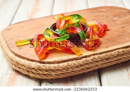 Jelly worms, candies, sweets in a bowl