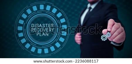 Inspiration showing sign Disaster Recovery Plan. Concept meaning having backup measures against dangerous situation Royalty-Free Stock Photo #2236088117
