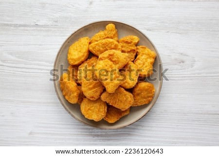 Homemade Chicken Nuggets with Ketchup, top view. Flat lay, overhead, from above.  Royalty-Free Stock Photo #2236120643