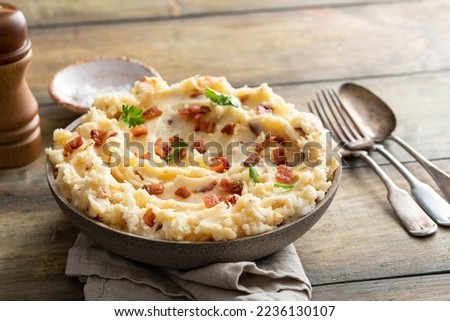 Bacon mashed potatoes topped with bacon pieces, side dish recipe Royalty-Free Stock Photo #2236130107