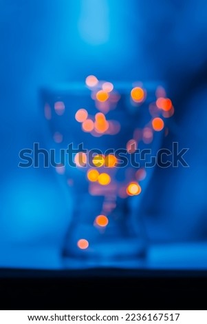 Colorful blurred bokeh lights. Winter festive background. 