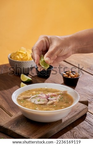 Typical food. Delicious encebollado fish stew from Ecuador traditional food from the house of national dishes. Ecuadorian food Royalty-Free Stock Photo #2236169119