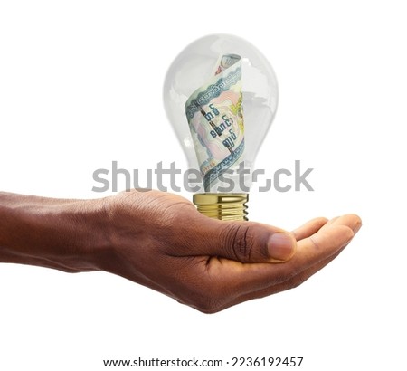 Black Hand holding 3d rendered Myanmar Kyat note inside transparent light bulb, creative thinking. Making money by solving problem. Having idea concept